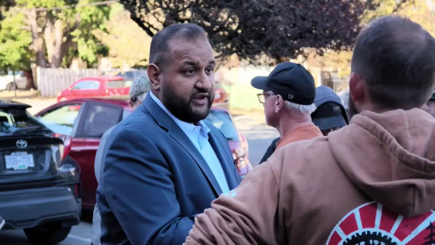 Ravi Parmar speaking to the Four Wheel Drive Association delegation outside his Langford campaign office, at 1:27 in the recording, as he says: You could take over Rady Creek Road if you wanted to