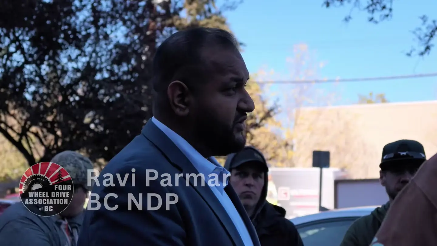 Ravi Parmar speaking to Four Wheel Drive Association of BC members outside his Langford campaign office. The recording&rsquo;s own caption identifies him: the Four Wheel Drive Association of BC badge, and the name Ravi Parmar over BC NDP.