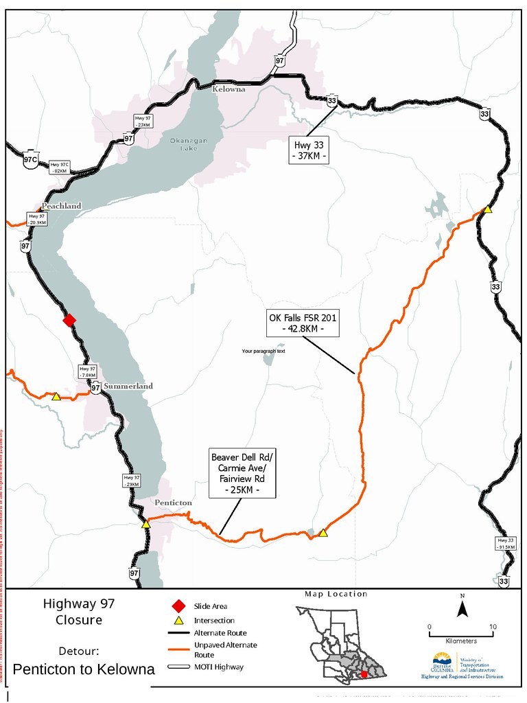A Ministry of Transportation map titled Highway 97 Closure, Detour: Penticton to Kelowna. An orange line marked Unpaved Alternate Route runs from Penticton east and north as the OK Falls FSR 201, 42.8 km, to Highway 33, which runs into Kelowna.